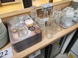 a lot of glassware on a table in a store