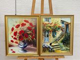two paintings of flowers are on easels in front of a white wall