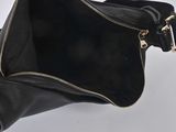 the inside of a black purse with a zipper on it