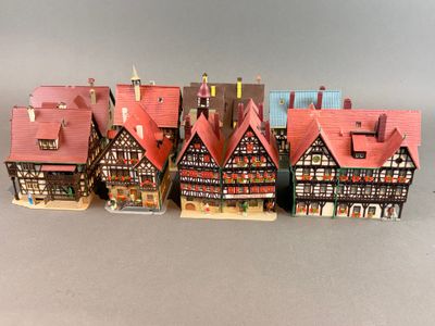 tout un tas de maisons miniatures posées sur une table