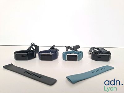 a lot of gadgets that are sitting on a table