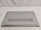 a laptop that is sitting on a white surface