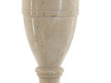 a vase that is sitting on a stand on a white background