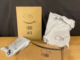 an amazon box and a package of amazon products sitting on a table