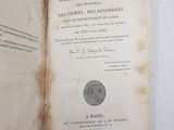 a book opened on a table with a picture of a fingerprint on it