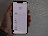 someone is holding up a phone with an app on the screen