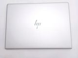 the back of a white laptop with a hp logo on it