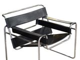 an image of a black and chrome chair on a white background