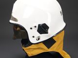 a close up of a white helmet with a yellow and black stripe
