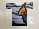 a picture of a t - shirt with a guitar on it
