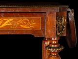 a wooden table with a drawer on top of it