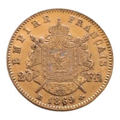 Gros plan sur une pièce d'or ornée d'une couronne