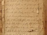 an old piece of paper with writing on it in a wooden frame
