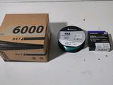 a box of tape next to a box of tape on a table