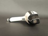 a black and white hair dryer sitting on a table