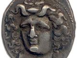une pièce de monnaie en argent portant un visage de femme