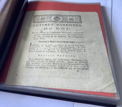 a book with a page in it sitting on a table