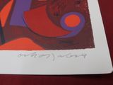 a picture of a red and purple painting on a red table