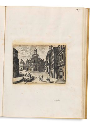 an open book with a drawing of a street in the middle of it