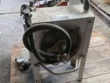 a small machine that is sitting on a pallet