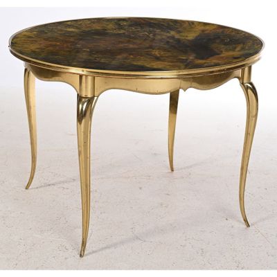 une image représentant une table dorée avec un plateau et des pieds en marbre