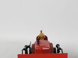 a red snow plow with a man in it