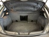 a trunk of a car with a speaker in it