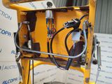 a close up of a forklift with wires attached to it