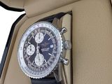a watch that is in a case on a white background