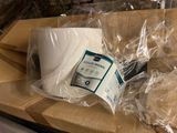 two rolls of toilet paper sitting on top of a box