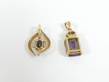 two gold and amethorate pendants