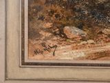 a picture of a painting of a mountain scene in a frame