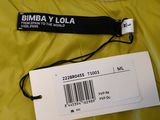 an image of a yellow jacket with a label on it