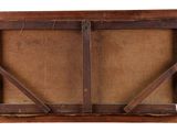 an old wooden window with a brown frame and a brown door