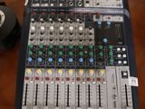 a sound board sitting on top of a wooden table