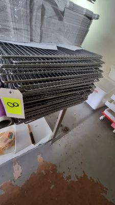 a pile of steel bars stacked on top of each other