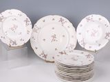 a lot of plates that are sitting on a table