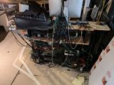 a lot of wires that are tangled up on the floor