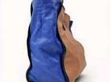 an image of a blue and brown handbag on a white background