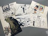 a lot of cartoon pictures on the table together