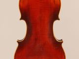 an old violin with a wooden back and a long neck