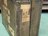 an old suitcase sitting on the floor in a room