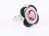 an image of a pink and black rose shaped ring with diamonds