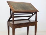 an image of a wooden desk with a glass top