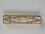 an image of a gold and enamel broochle with flowers