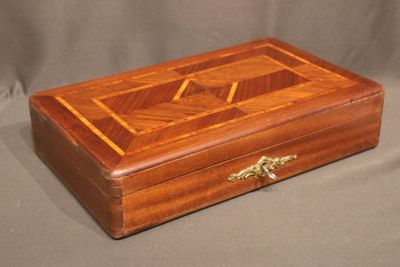 an image of a wooden box on a grey background
