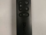 an image of a close up of a remote control on a table