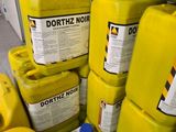 several yellow plastic containers are stacked on top of each other