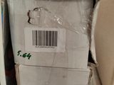 a box with a barcode on it sitting on a shelf