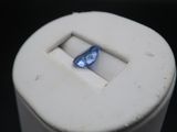 a small white box with a blue button in it